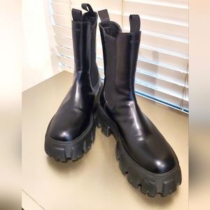 Black leather combat boots